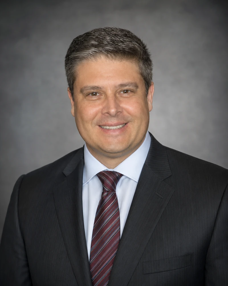Retrato profissional do Dr. Gustavo Duarte Mendes